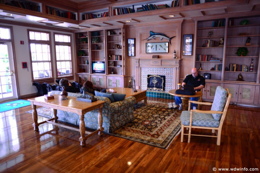 Disney's Old Key West Resort | a Man Sitting On The Living Room With Laptop On His Table