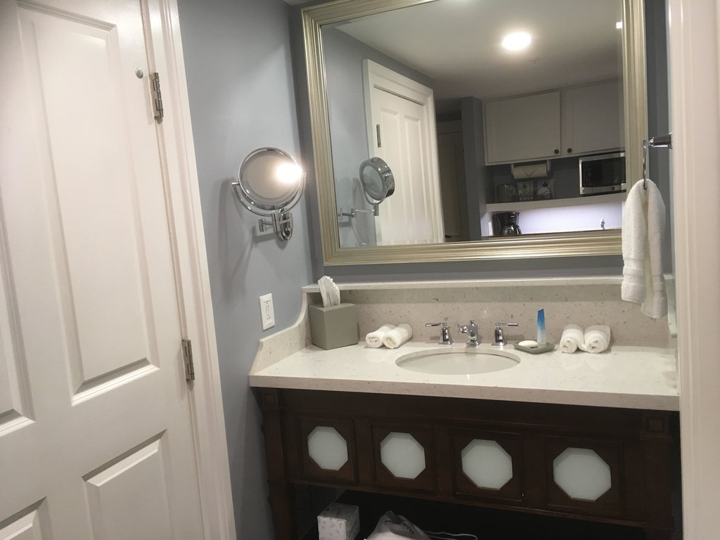 DVC Listing Testimony | Sink and Mirror Outside the Bathroom with Fresh Towels and Tissues