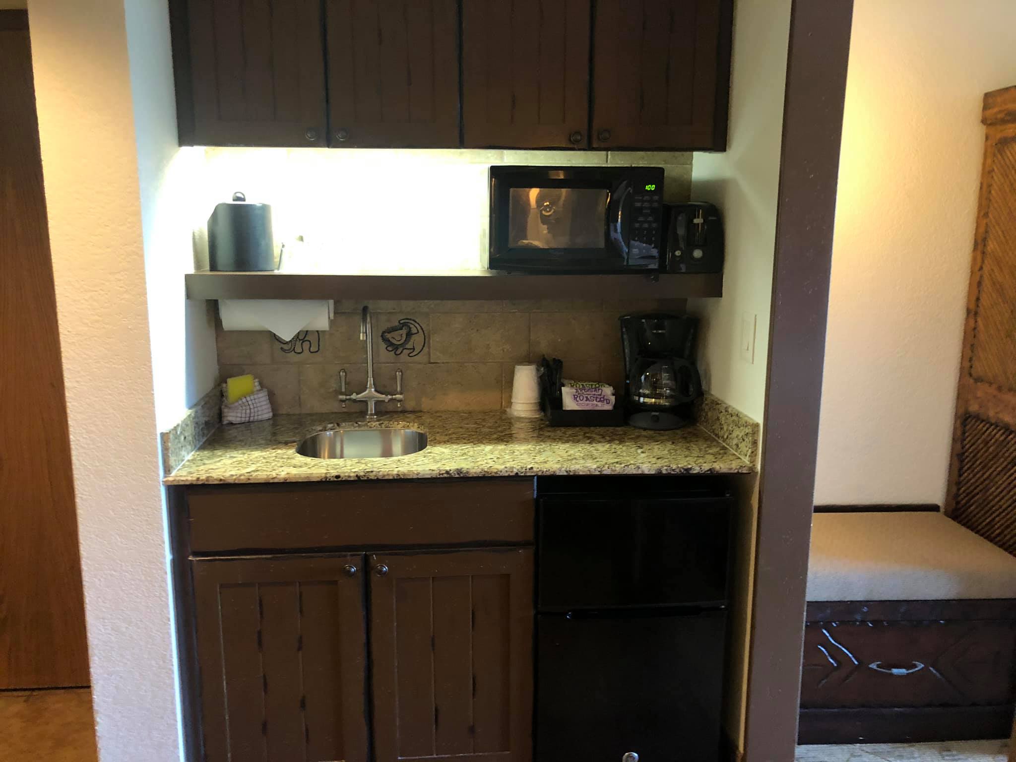 Jambo House Deluxe Studio | Closer View of Kitchenette With Sink. Oven and Mini Fridge.