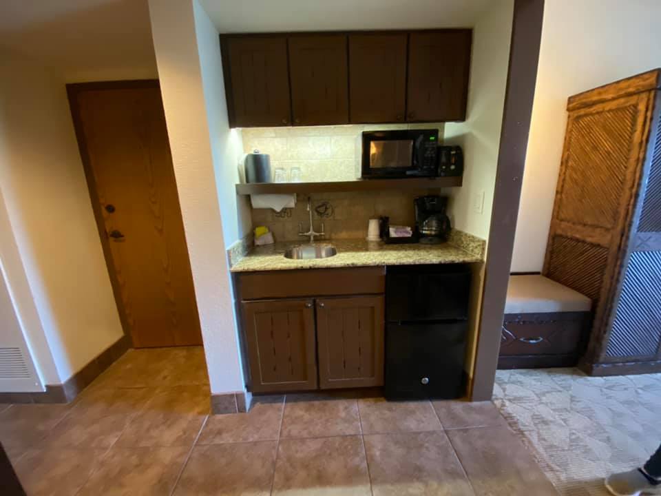 Jambo House Deluxe Studio | Kitchenette With Sink. Oven and Mini Fridge.